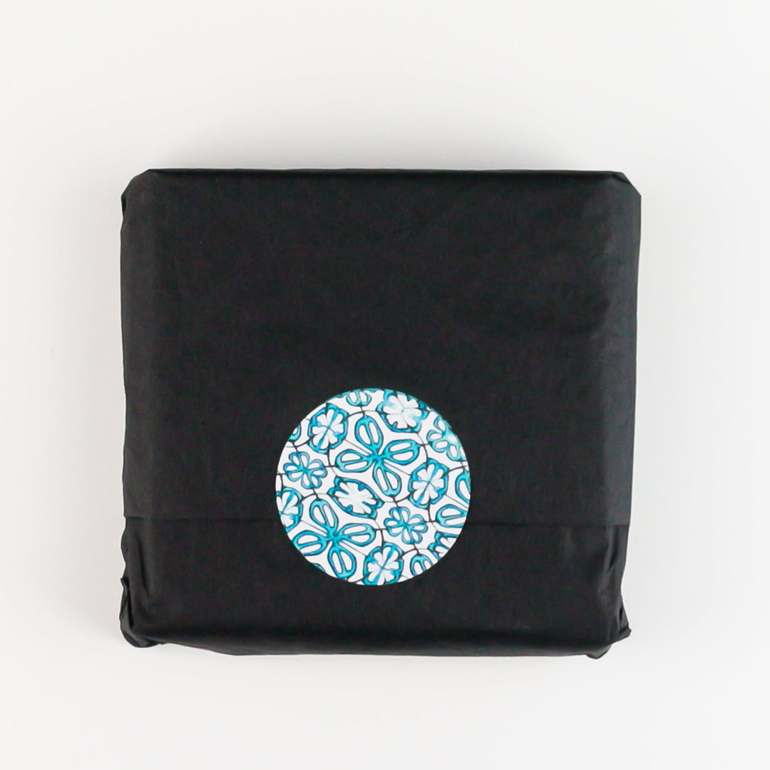Flourishing garden glass coasters - round